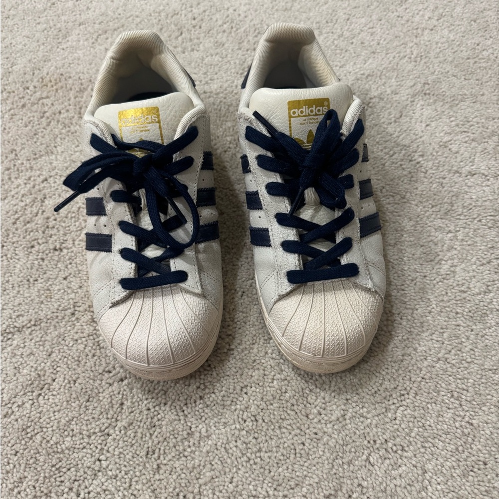Adidas Superstars in Cream and Navy. Size 5.5 in big kids (fits 7.5 or 8 womens)